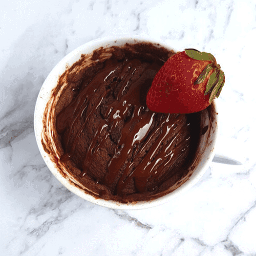 Best keto chocolate cake in a mug that’s easy to make, low carb, gluten free and sugar-free. This one minute keto chocolate mug cake recipe can be easily made in a microwave in minutes. Is moist and gooey and super delicious!